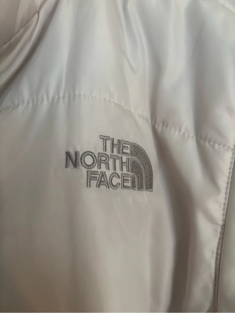 The North Face cream colored Puffer Jacket